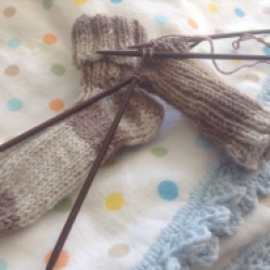 Knitting baby socks