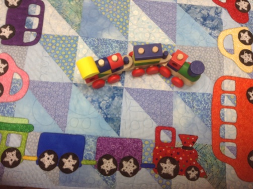 "quilts, bibs, blankies ... oh my!" by Kim Schaefer quilt "cars, buses, trucks and trains quilt"