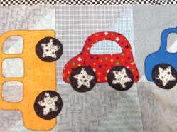 Buzy making a car quilt for a 2 year old little man.